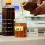 stock of used cooking oil in jerry cans.  used cooking oil collectors to reduce environmental pollution from household waste to be recycled into biodiesel raw materials
